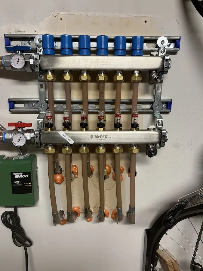 Plumber performing Leak Detection at a residential property in Milford